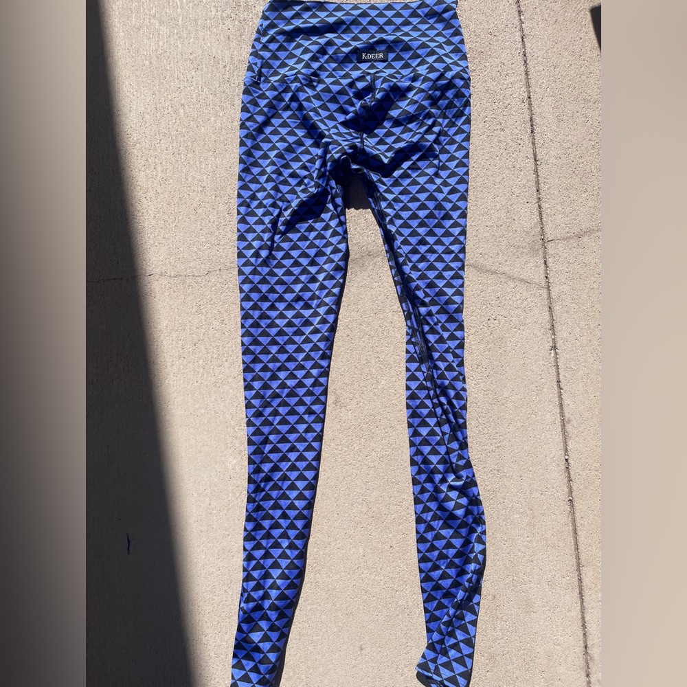 Purple and black geometric K-DEER leggings. Rare — no longer produced!